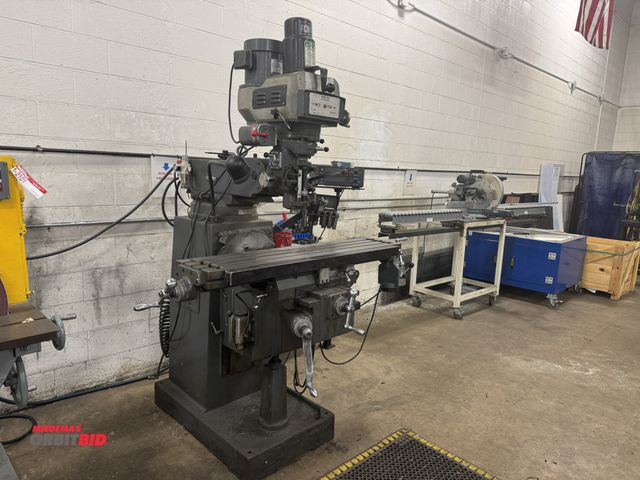Lot 1-2102 - (1) Pinnacle milling machine, 50" x 10.5" slotted power feed table, Kurt Power Lock Drawbar, low spe...