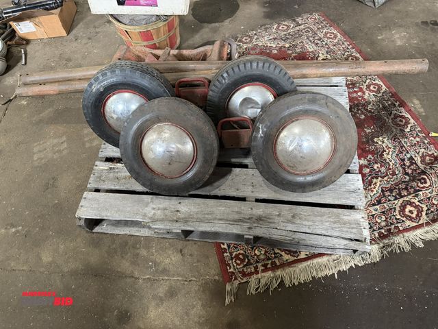 Lot 1-1177 - (1) vintage dual axle automotive dolly with approx. 16" diameter wheels, and 75" wide axles, unknown...