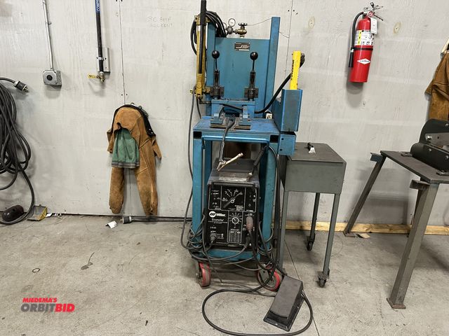 Lot 1-19229 - (1) Miller Econotig CC-AC/DC TIG welder, S/N KG225378, single phase input, 150 amp, with cables, tor...