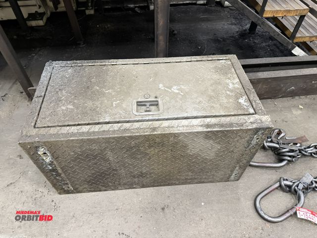 Lot 1-15544 - (1) undermount Diamond Plate tool box, 36" x 18" x 18".