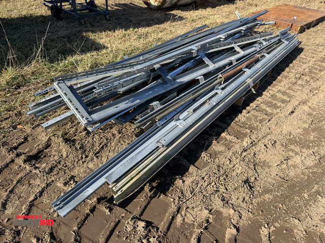 Lot 1-2967 - Large lot of assorted garage door track and hardware, includes springs, and more.