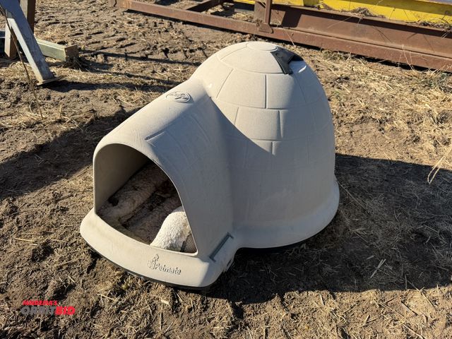 Lot 1-2935 - (1) Indigo Pet Mate Igloo house, and (1) plastic True Temper wheelbarrow, has some cracks in bottom.