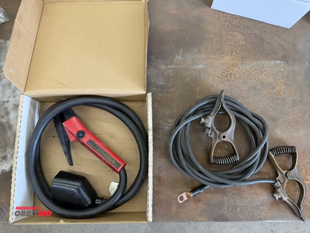 Lot 1-6180 - (1) Arcair, model K4000, angle-arc torch, appears to be used, and (1) used ground cable with dual cl...