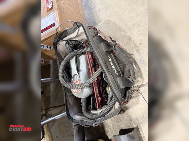 Lot 1-18628 - (1) Tower 12V inflator, includes a Husky tool bag (approx. 16" long x 10" deep), pipe connections, s...