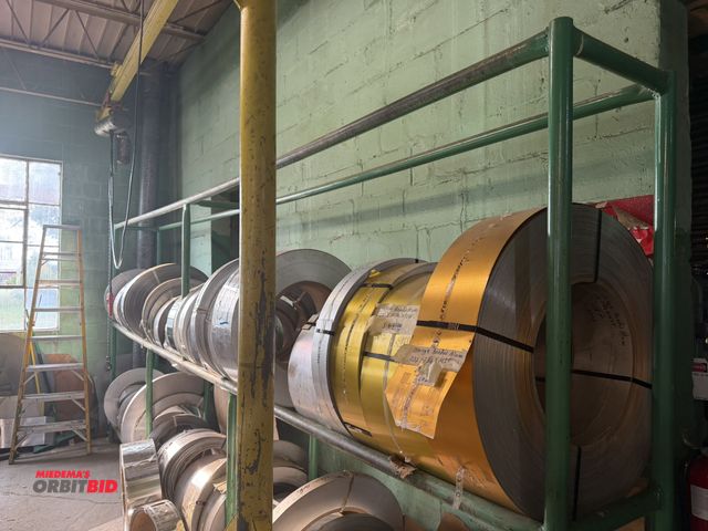 Lot 1-18673 - Entire contents of rolls of metal on top shelf only, includes anodized aluminum, non-anodized alumin...