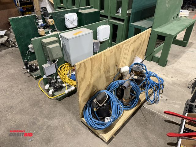 Lot 1-18541 - Lot of (3) wood pump and equipment stands, with contents including various sump pumps, Rainbird time...