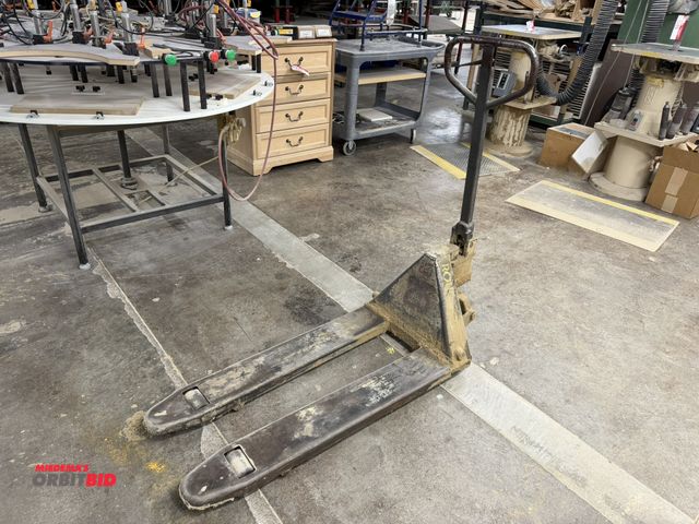 Lot 1-16494 - (1) pallet jack, 40" forks, spacing from outside to outside of forks is 20", in working condition.