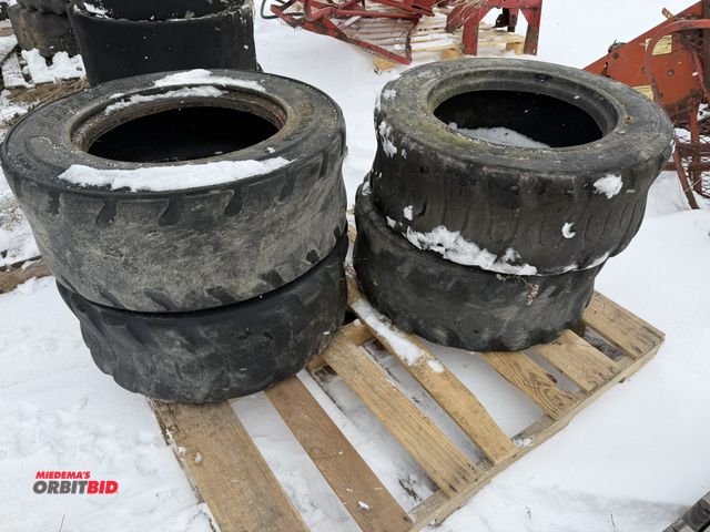 Lot 1-11697 - Lot of (4) used 10-16.5 skid steer tires.