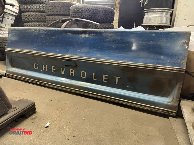 Lot 1-1250 - (1) tailgate for 1980's era Chevrolet pickup truck, actual model, and year unknown.