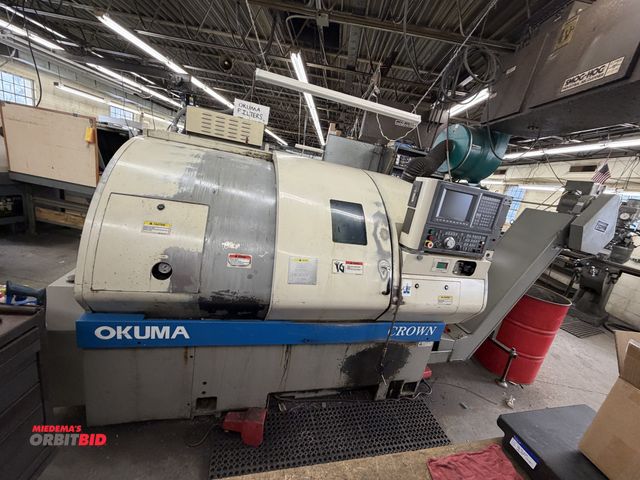 Lot 1-1612 - 1998 Okuma 762S Crown CNC Turning Center Okuma OSP-U100L CNC Controls, 10" 2-Jaw Chuck, 12-Position ...