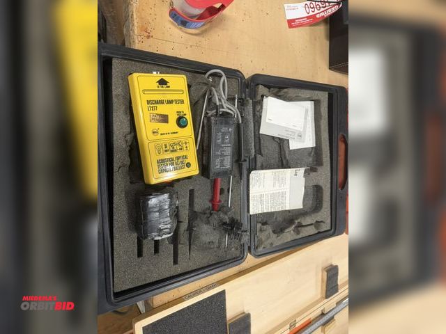 Lot 1-16961 - (1) discharge lamp tester, and (1) Unitest 440 voltage tester with case.