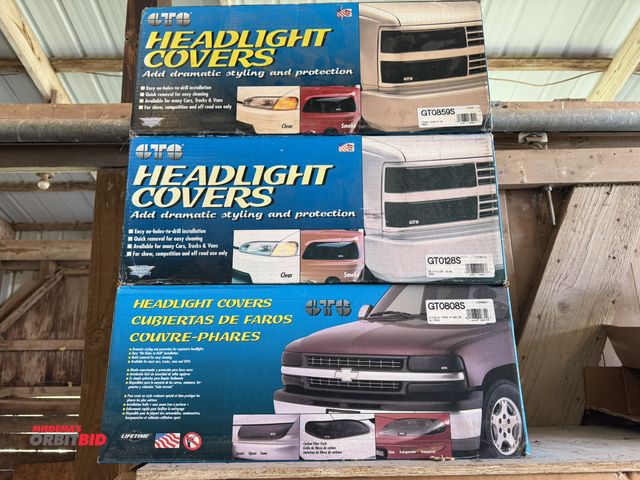 Lot 1-8517 - Lot of (3) GTO headlight covers for a Hyundai Scoupe, 1991-92, GMC Jimmy 1982-90, and Mitsubishi Mir...