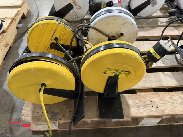 Lot 1-5338 - Lot of (2) custom made steel, 20" long retractable cord reel mounts with (4) various 30' retractable...