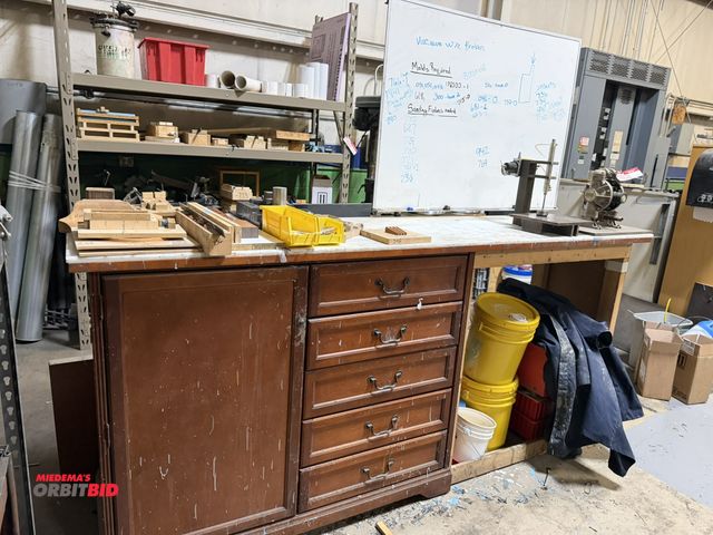 Lot 1-18643 - (1) 8' x 24" wide wood cabinet with pull out drawers and poly style top, includes assorted molds, sc...