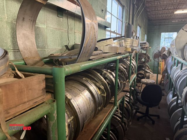 Lot 1-18779 - (1) 125" length x 63" height x 18" depth, 3-tier tube steel rack with contents of rolls of non-magne...