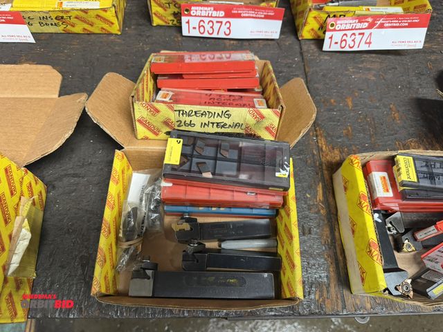 Lot 1-6375 - Lot of assorted top lock threading tool holders with inserts, 266 threading internal inserts, and mo...