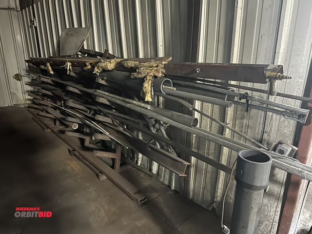 Lot 1-14405 - (1) Approx. 113" length x 48" height steel cantilever rack, full of assorted tube steel, (1) 4" x 8'...