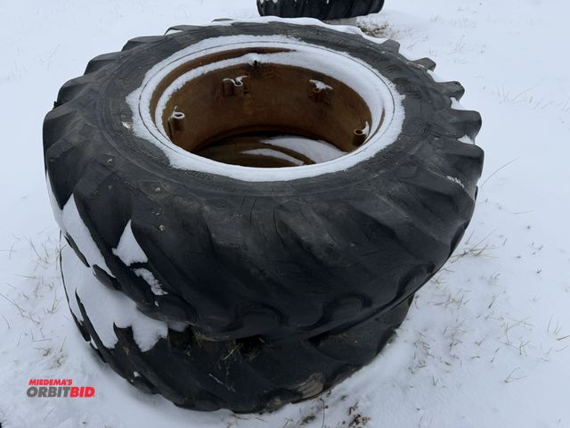Lot 1-11651 - (1) set of Goodyear 14.9-24 clamp on duals, tires are cut, cracked and weather checked.