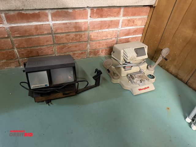 Lot 1-12189 - (1) Mansfield, model 950, reel machine, and (1) Keystone 250, reel machine.