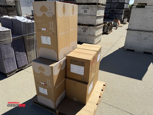 Lot 1-102539 - Assorted lot of labels and locks, one skid total