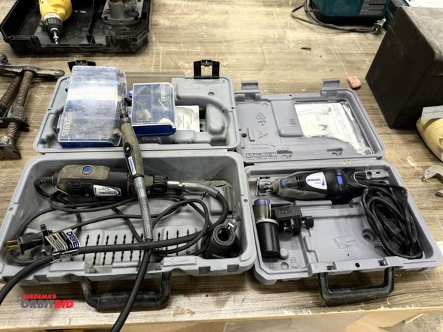 Lot 1-16609 - Lot of 2 Dremel tools, (1) Dremel 300, and (1) Multi Pro rotary tool, includes (2) cases of assorted...