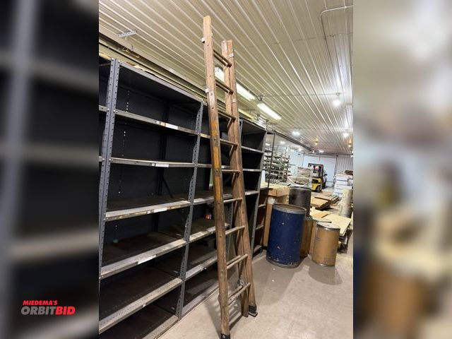 Lot 1-15879 - (1) 18' wood extension ladder.