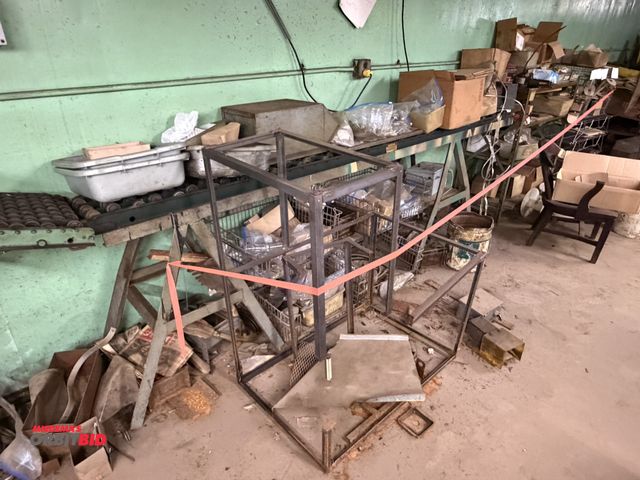 Lot 1-18481 - (1) section of roller conveyor, approx. 9.5' long x 12" wide, includes stand and contents of assorte...