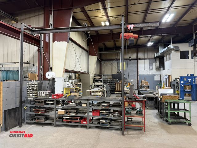 Lot 1-18698 - (1) custom built steel table with overhead bridge crane, table is 12' long x 26" wide x 40" tall, in...