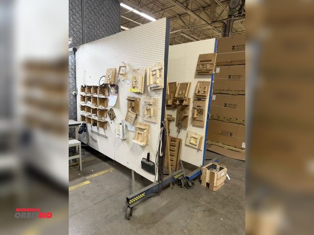 Lot 1-17517 - Lot of (2) heavy duty rolling, steel framed pegboard display racks, each measures approx. 124" lengt...