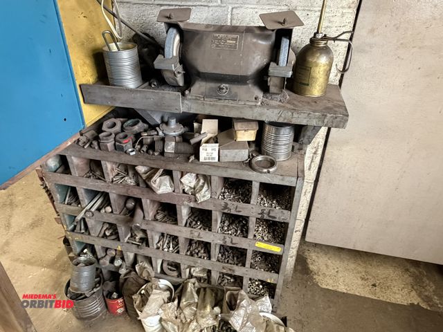 Lot 1-18558 - Contents of wood parts organizers, includes assorted bolts, nuts, assorted sizes, and (1) Ram bench ...
