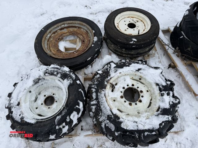 Lot 1-11666 - Lot of 5 assorted implement tires, includes (2) 4.0-12 tires on 6-bolt rims, (1) 4.0-19 on 5-bolt ri...