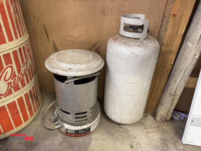 Lot 1-14216 - (1) Coleman 30,000-60,000 propane heater with 40 lb. propane tank.
