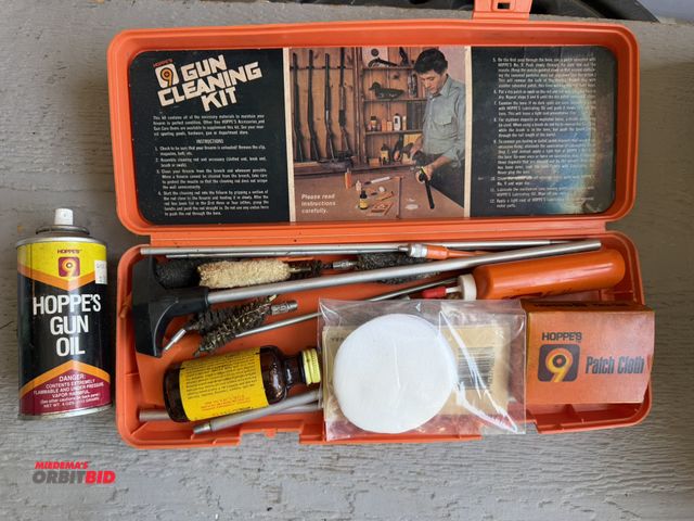 Lot 1-8385 - (1) Hoppe's gun cleaning kit with partial 4 oz. container of Hoppe's gun oil.