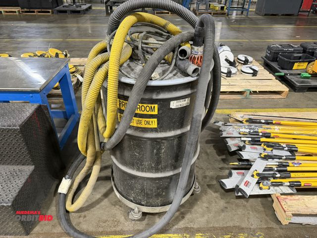 Lot 1-5376 - (1) 55 gallon drum on a rolling base with Exair air powered Chip Vac attached, and assorted hoses.