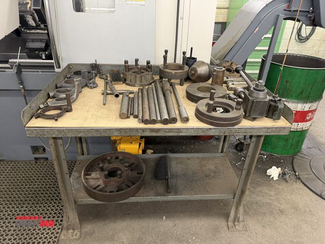 Lot 1-1707 - Large lot of assorted lathe tooling, includes 17" face mill, dog ears, grooving tool holders, lathe ...