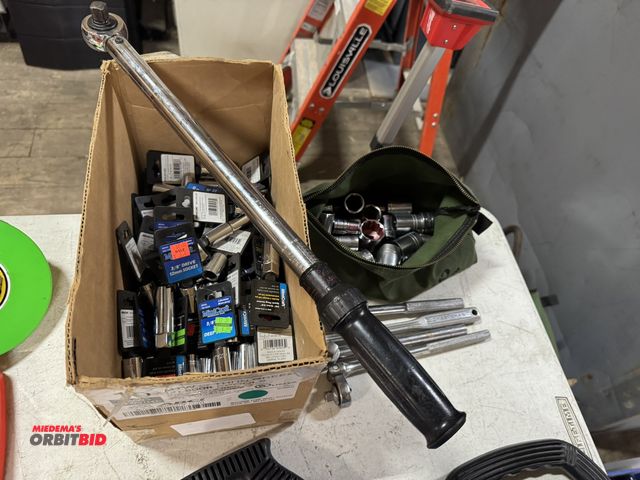 Lot 1-4319 - Large lot of assorted new sockets, (1) 1/2" Craftsman torque wrench, 3/8" and 1/2" drivers, and (1) ...
