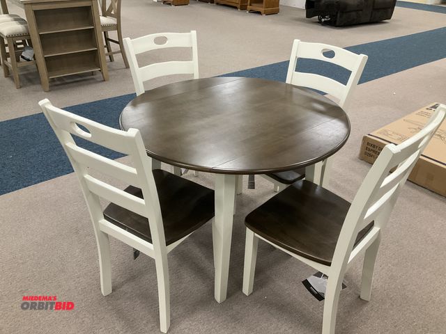 Lot 1-17269 - Signature Design dining room table set with four chairs, circular table stands approximately 30” tal...