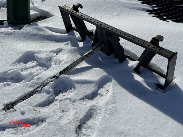 Lot 1-11589 - (1) single point loader tractor bale spear, approx. 43" long, loader attachment brackets are 41" on ...