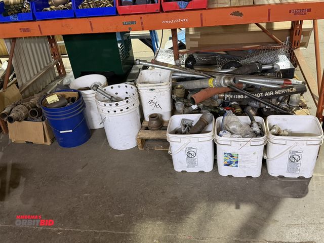 Lot 1-18577 - Entire contents of floor shown in photo, includes various pipe fittings, heavy duty rubber hoses, se...