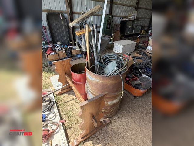 Lot 1-8534 - Lot of assorted garden hoses, (1) 55-gallon drum, (1) Citgo 15-gallon steel drum, and more.