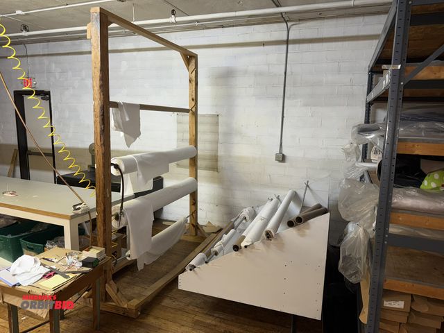 Lot 1-4792 - (1) custom built, wood framed fabric rack, approx. 73" wide x 8' tall with 28" base, (1) rolling fab...