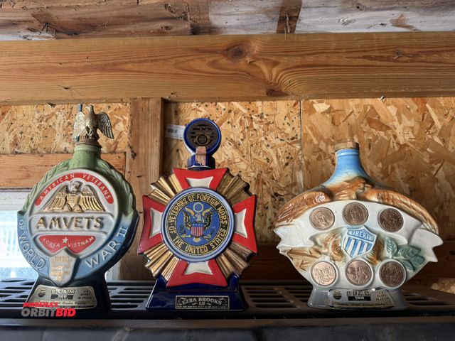 Lot 1-8324 - Lot of (3) collectible whiskey bottles.