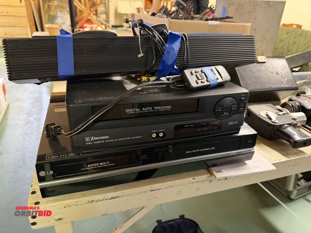 Lot 1-12193 - (1) Emerson digital auto-tracking VHS, and (1) LG Super multi DVD/VHS recorder.