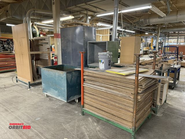 Lot 1-16480 - (4) rows of racks, 48" x 35.5" x 9" tall, with contents of wood, also includes dust collector table ...