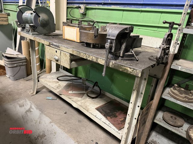 Lot 1-18587 - (1) Hallowell metal shop table, 60" x 29", includes a Bessey 6" bench top vise, and (1) Howe adjusta...