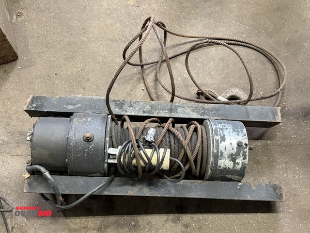 Lot 1-1165 - (1) make and model unknown, 12V, heavy duty winch, with wire cable and hand control, working conditi...