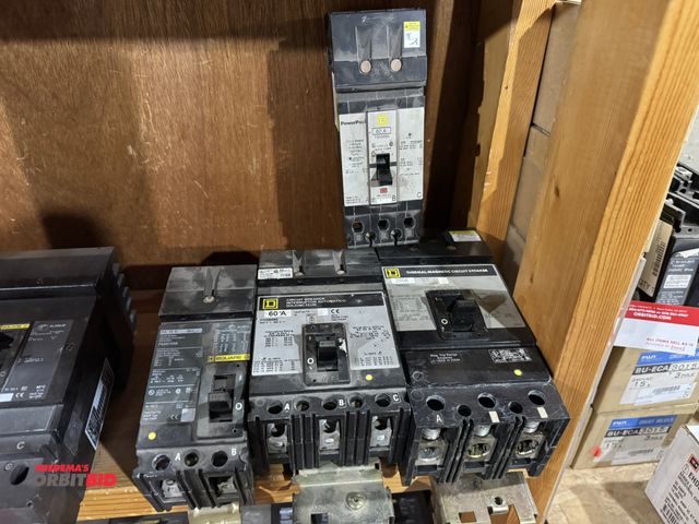 Lot 1-4466 - Lot of (4) assorted Square-D breakers, 200 amp, (2) 60 amp, and 15 amp.