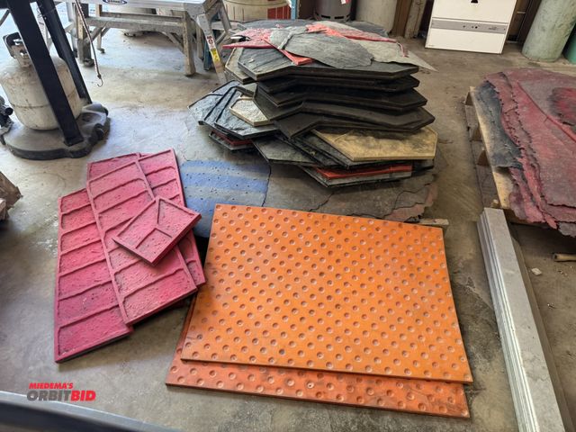 Lot 1-14227 - Large lot of assorted decorative concrete stamping forms.