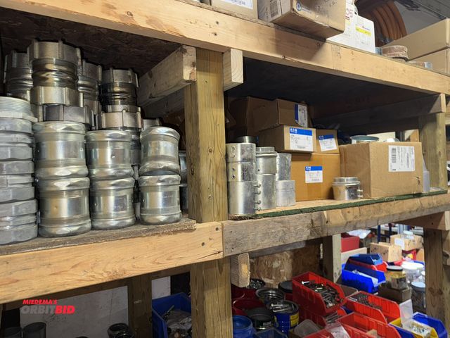 Lot 1-4280 - Contents of shelf, includes large assortment of compression couplings, 3.5", 3", 2", set screw type ...