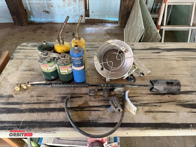 Lot 1-8344 - Lot of (6) various propane bottles (some full), and (1) propane powered heater.